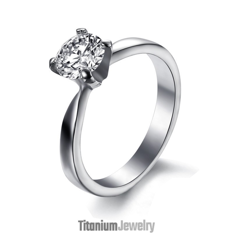 טבעת טיטניום נשית בעלת ביצועים אמינים עם אבני חן