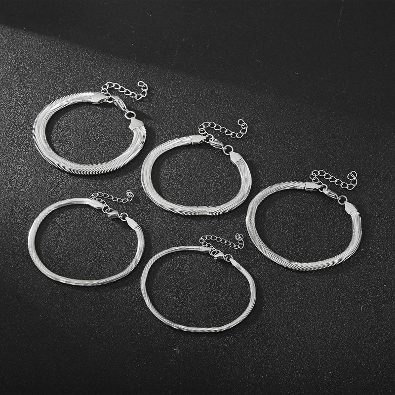 צמידי טיטניום אופנתיים עם שרשרת עצם נחש לגברים ולנשים